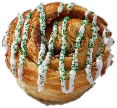 An Irish Cream Duffeyroll with white icing and green sparkle sugar