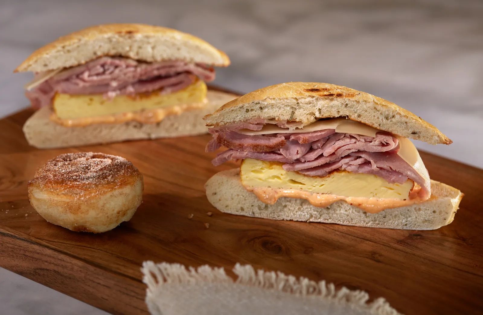 Morning Ham breakfast sandwich on rosemary ciabatta, with a mini Duffeyroll.